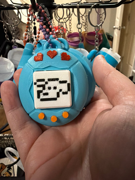 Tamagotchi clicker keychain